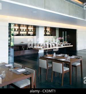 Alila Bangalore Hotel and Apartments, Bangalore, India. Architect: Allies and Morrison, Hundred Hands, 2012. Dining area with bu Stock Photo