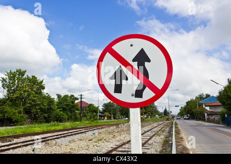 Traffic Sign informs Drivers Overtaking Prohibited. Stock Photo
