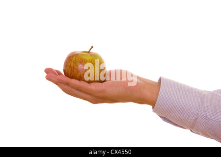 Hand holding a red and green apple isolated on white