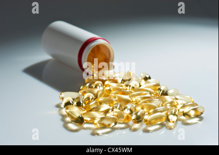 Tablets pipe with undistributed clear capsule isolated Stock Photo