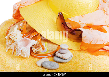 Beach items a hat, a towel and slippers, it is isolated on white Stock Photo