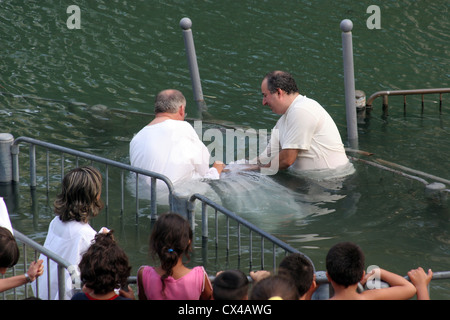 Baptismal site at Jordan river shore. Baptism of pilgrims in Yardenit, Israel on September 30, 2006. Stock Photo