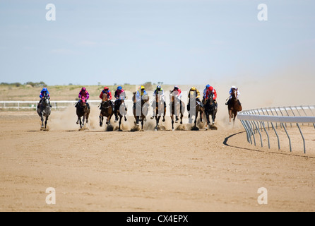 Horse racing in the outback at the Birdsville Cup races.  Birdsville, Queensland, AUSTRALIA. Stock Photo