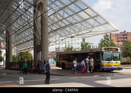 Passengers loading MBTA bus stop in Boston, Massachusetts Stock Photo