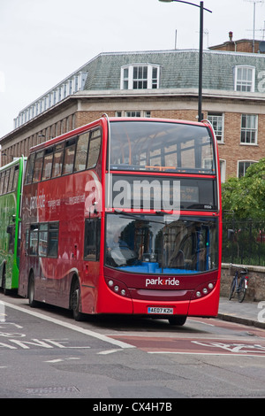 Red double decker public transport bus operating on Cambridge park & ride route Stock Photo