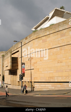 Side view of The National Museum of Scotland, Edinburgh, under a stormy sky.