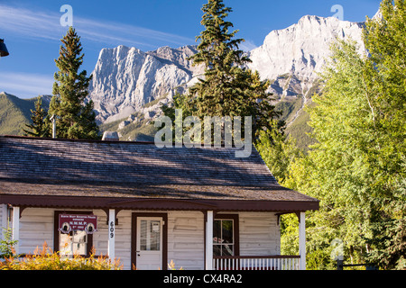 The old preserved barracks of the north West mounted Police in Canmore in the Canadian Rockies in Banff National Park. Stock Photo