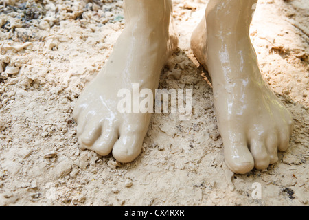 Feet in mud close-up Stock Photo
