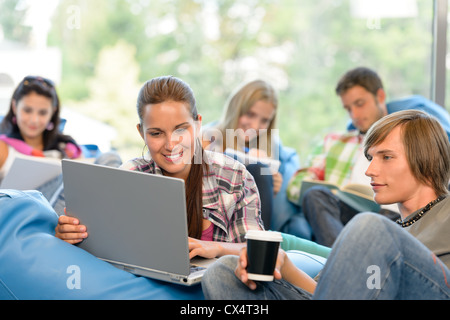 Students working on project in study room high-school teens laptop Stock Photo