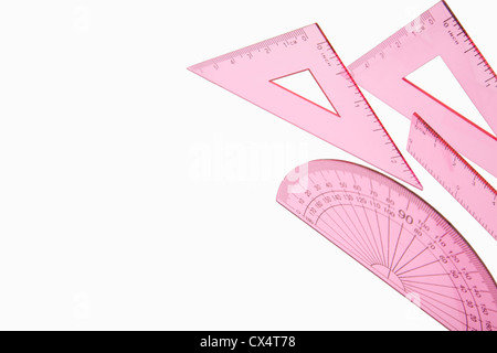 Close up shot of a pink maths set isolated on a white background Stock Photo