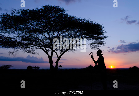 Turmi Ethiopia Africa Lower Omo Valley village sunset twilight Bena tribe silhouette in sky #24 Stock Photo