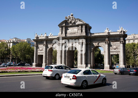 The Puerta de Alcala, built in 1778 to honour Carlos the third it was designed by Sabatini and made in granite stone. Stock Photo