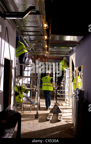 Electricians working on Orthopaedic hospital Birmingham Stock Photo