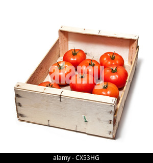 Box of beef tomato's isolated on a white studio background Stock Photo ...