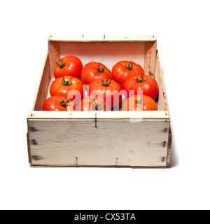 Box of beef tomato's isolated on a white studio background Stock Photo ...