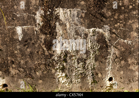 Long term structural damage caused from leaking water building up calcium carbonate deposits through concrete that has cracked Stock Photo