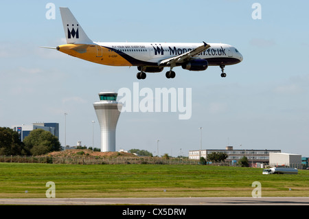 Monarch Airbus A321 aircraft landing at Birmingham Airport Stock Photo