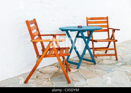 Colorful table and chairs arrangement Stock Photo