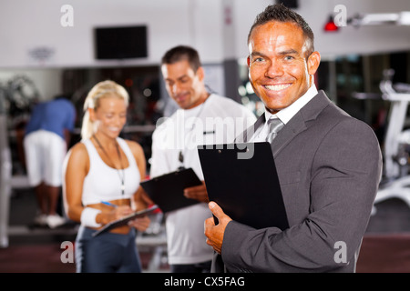 confident gym manager and staff Stock Photo