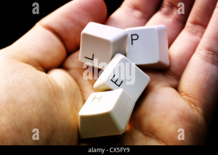HELP - keyboard in a hand ! Close-up with great details ! Stock Photo