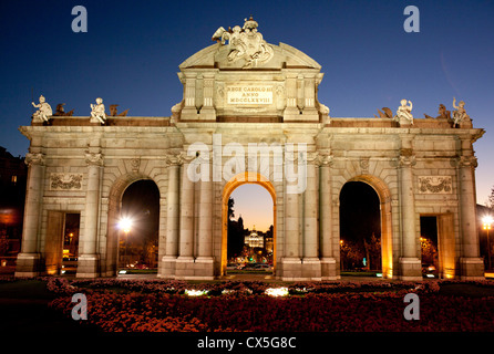 The Puerta de Alcala, built in 1778 to honour Carlos the third it was designed by Sabatini and made in granite stone. Stock Photo