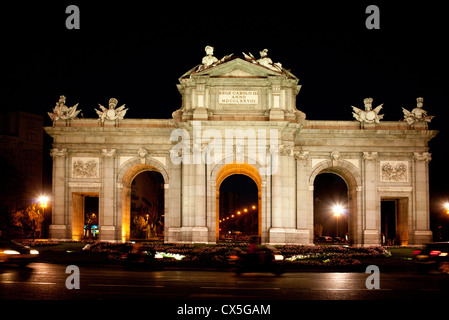 The Puerta de Alcala, built in 1778 to honour Carlos the third it was designed by Sabatini and made in granite stone. Stock Photo