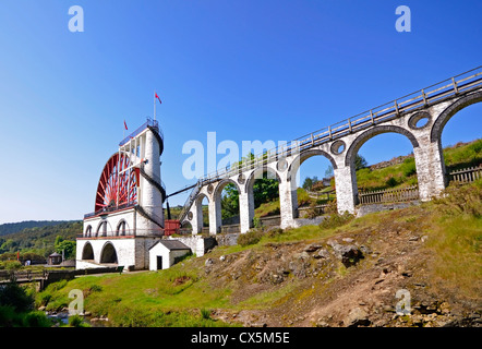 The Great Laxey Wheel with viaduct on sunny day - Isle of Man Stock Photo