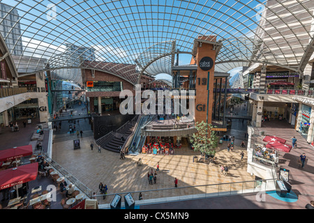 INTERIOR OF CABOT CIRCUS SHOPPING CENTRE SHOWINGGLASS ROOF AND SHOPPING LEVELS, BRISTOL ENGLAND UK Stock Photo