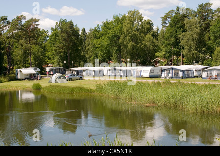 swedish campsite camping in sweden tent tents caravan caravans near water lake västervik lysingsbadet camp site sites campsites Stock Photo