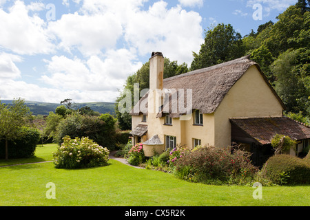 Thatched cottage on Selworthy Green in the Exmoor village of Selworthy, Somerset, England, UK Stock Photo