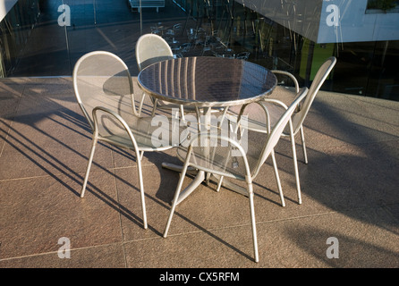 Stainless metal table and chairs in California Plaza,South Grand Avenue, Bunker Hill District, Los Angeles, California, USA Stock Photo