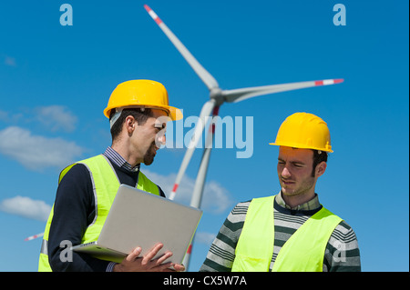 Two Engineers in a Wind Turbine Power Station, Italy Stock Photo