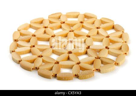 Round bamboo trivet isolated on white Stock Photo