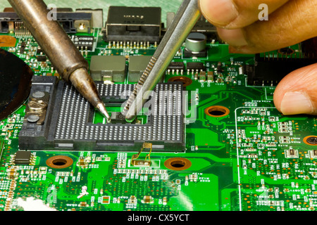 repairing circuit board Stock Photo