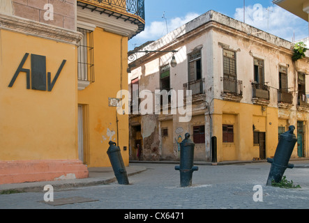 Upturned Canon Bollards at the corner of Plaza Vieja & Calle San Ignacio, Habana Vieja, Havana, Cuba, Caribbean Stock Photo