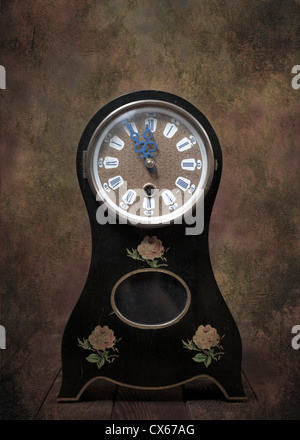 an old table clock in Biedermeier style Stock Photo