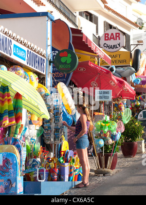 ALGARVE, PORTUGAL. Colourful shops selling beach toys and accessories at Praia do Carvoeiro. 2012. Stock Photo