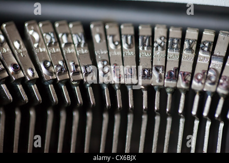 A set of typebars showing the letters on an old typewriter Stock Photo