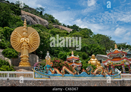 Female deities golden figures Khao Takiab Buddhist temple Hua Hin Thailand Stock Photo