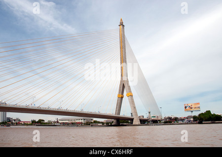 Traffic on the Chao Phraya River and Bangkok skyline Thailand Stock Photo