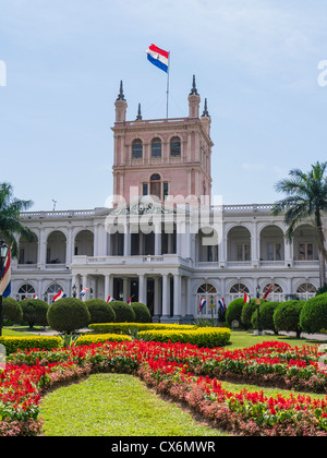 The Paraguayan flag flies above the Palacio de López in Asunción, Paraguay. Stock Photo
