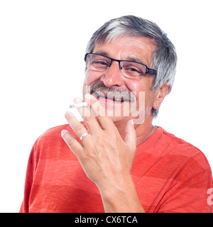 Happy senior man smoking cigarette, isolated on white background. Stock Photo
