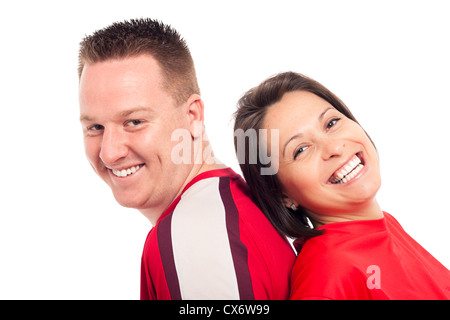 Close up of young happy couple laughing, isolated on white background. Stock Photo