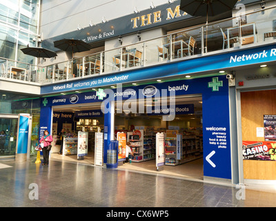 Boots shop inside Piccadilly station Manchester UK Stock Photo