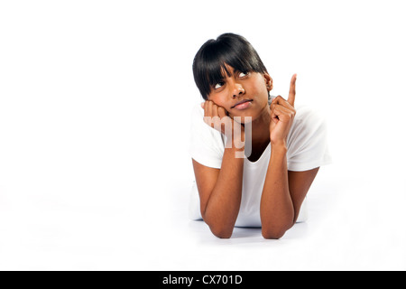 young indian woman pointing on white Stock Photo
