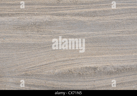 Scuffed dry sand on beach / shoreline. Perranporth beach, Cornwall. Mars-like flow patterns concept or fluvial ridges for stratigraphy study. Stock Photo