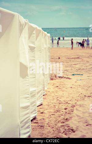 Rows of beach tents on beach of Les Sables-d'Olonne, Vendee, Pays de la Loire, France, Europe. Stock Photo