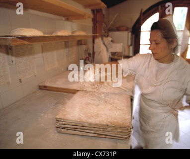 Still Fattoria La Vialla: Cook spreading flour Stock Photo