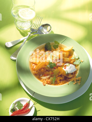 Red lentil soup with potatoes Stock Photo