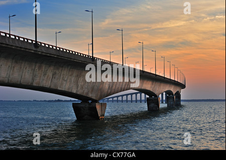 The Île de Ré bridge / Pont de l'île de Ré from La Rochelle to the island Ile de Ré at sunset, Charente-Maritime, France Stock Photo